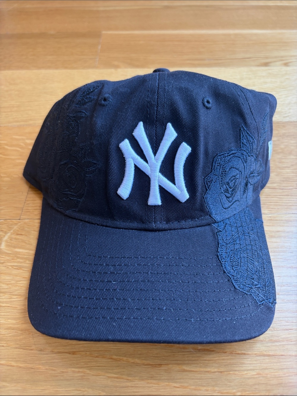 New Era Navy Yankees Cap with White NY Logo and Embroidered Roses